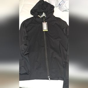Jogging jacket?  Thin material sweat proof